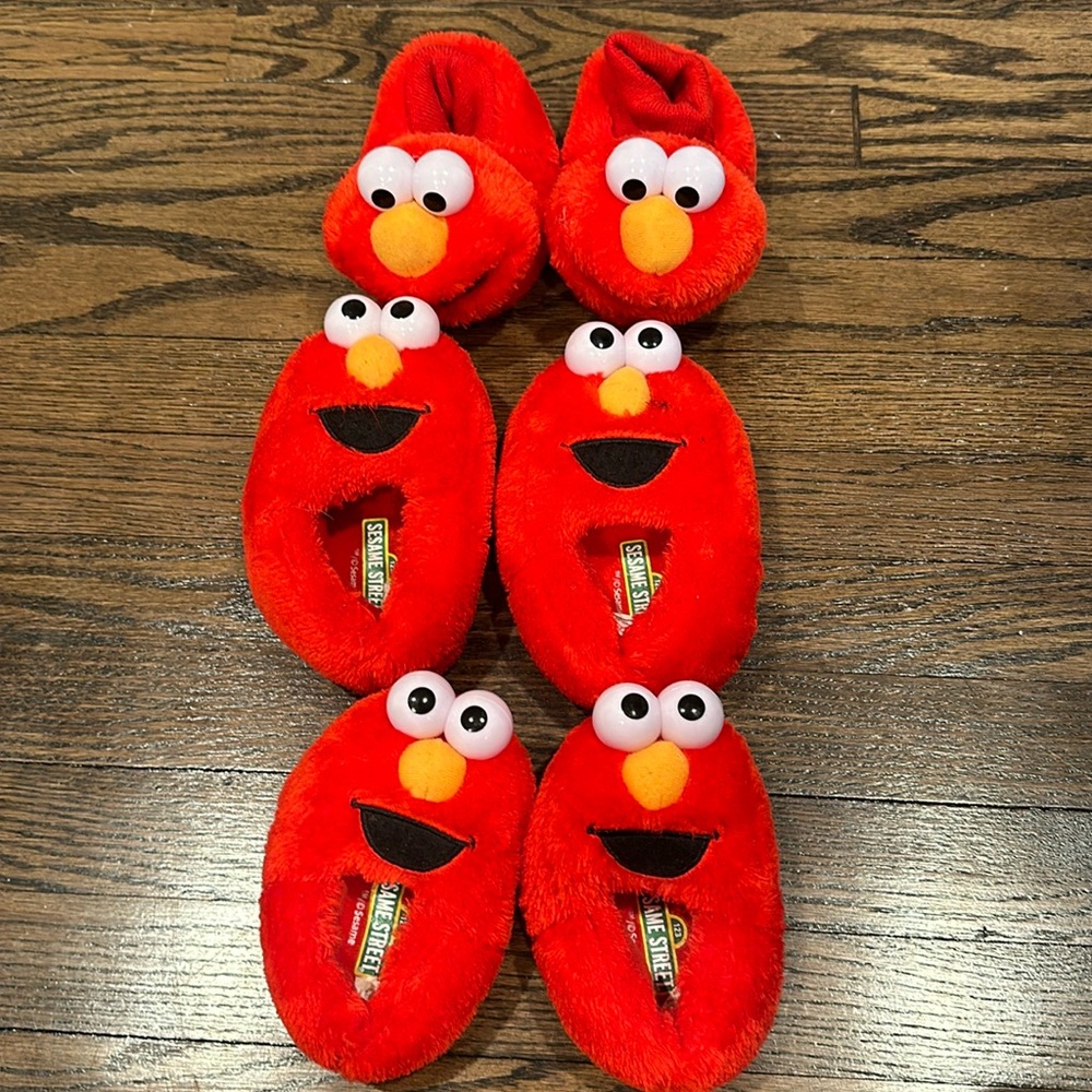 Three pairs of children’s  Elmo slippers